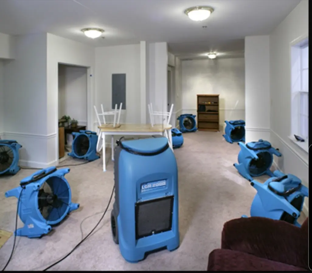 Air movers and dehumidifier setup for Water Damage Restoration in Connersville
